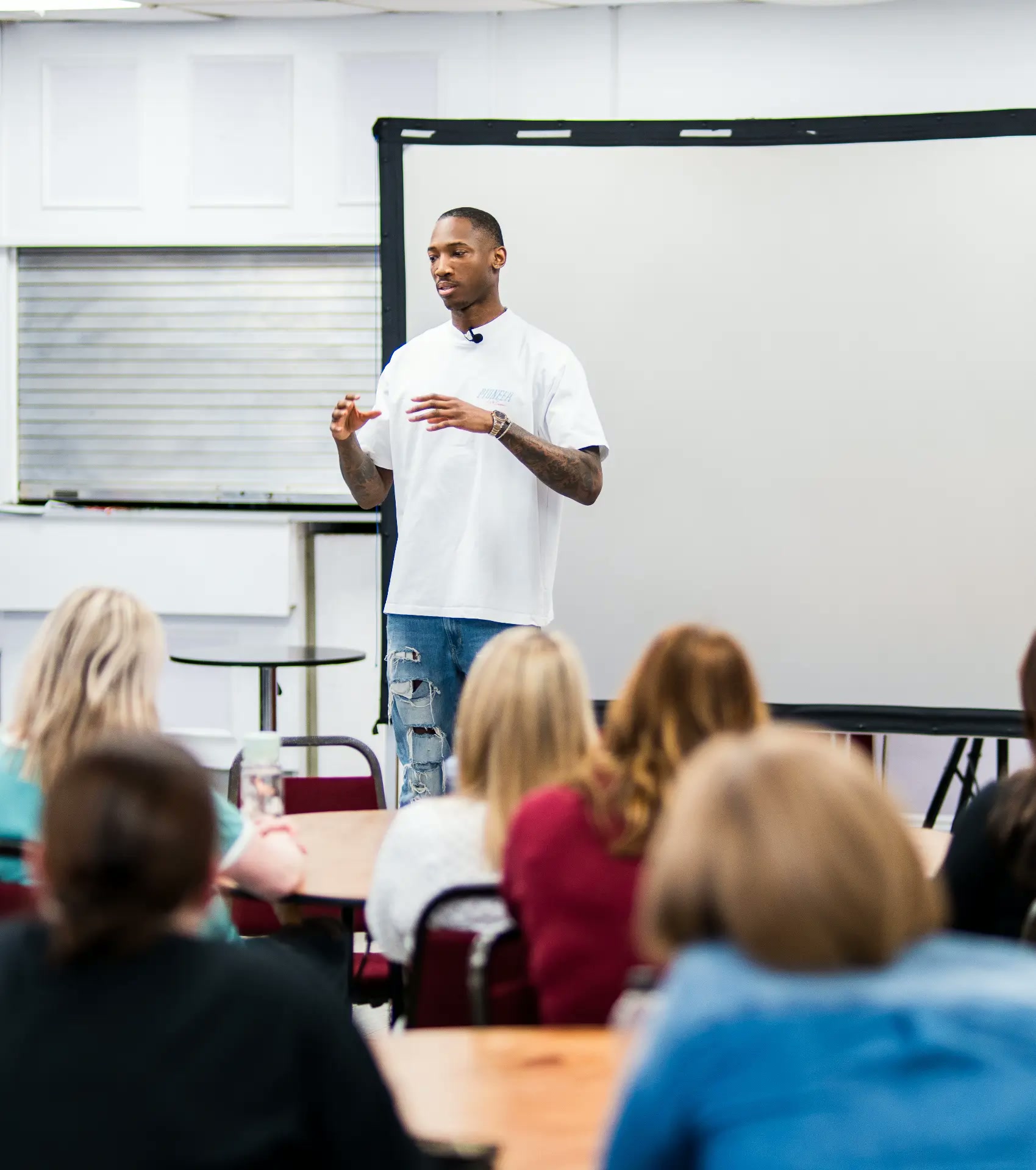 Kofi Josephs speaking to an audience